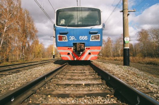 Blue and Black Train on Rail Tracks