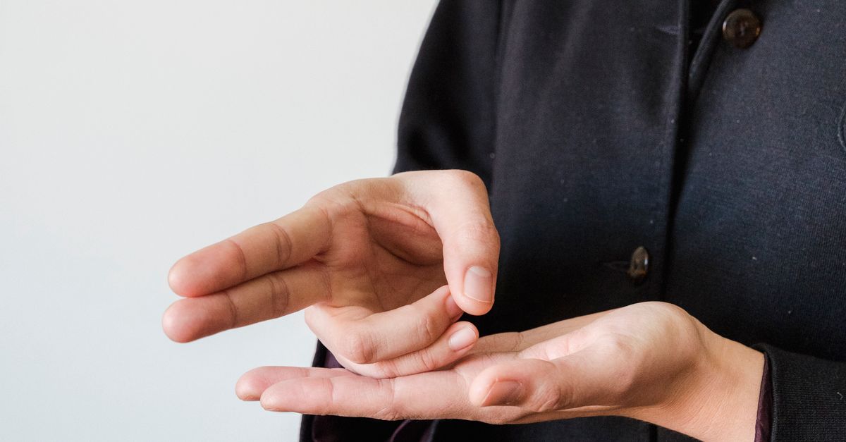 A Person Doing Sign Language · Free Stock Photo