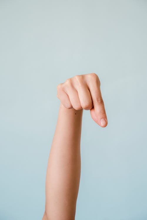 Free Hand Pointing Downward Stock Photo
