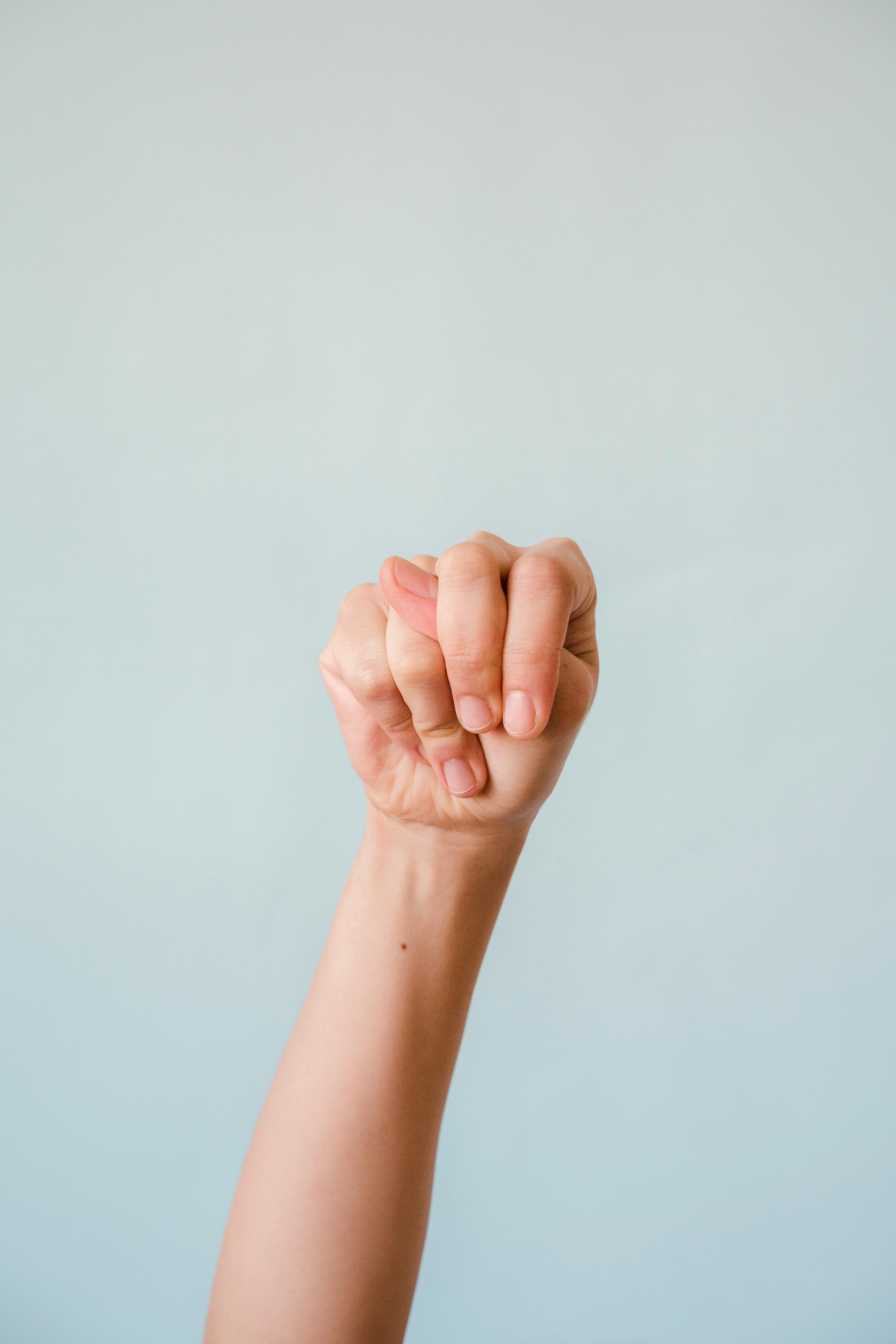 person doing sign language