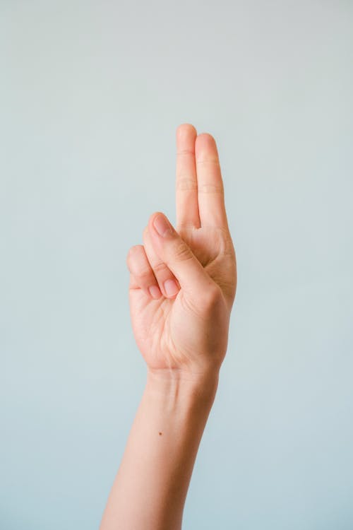 Hand Doing a Letter U Sign Language