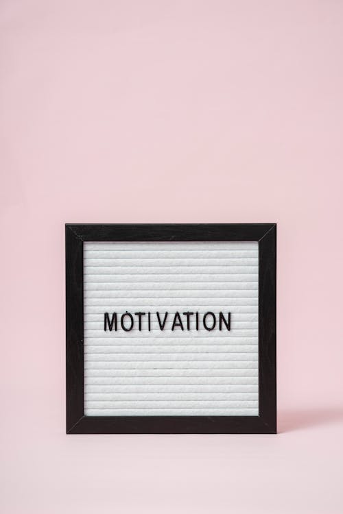 
A Letter Board with a Pink Background