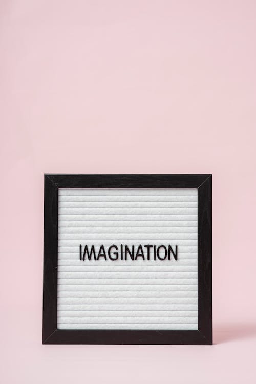 
A Letter Board with a Pink Background