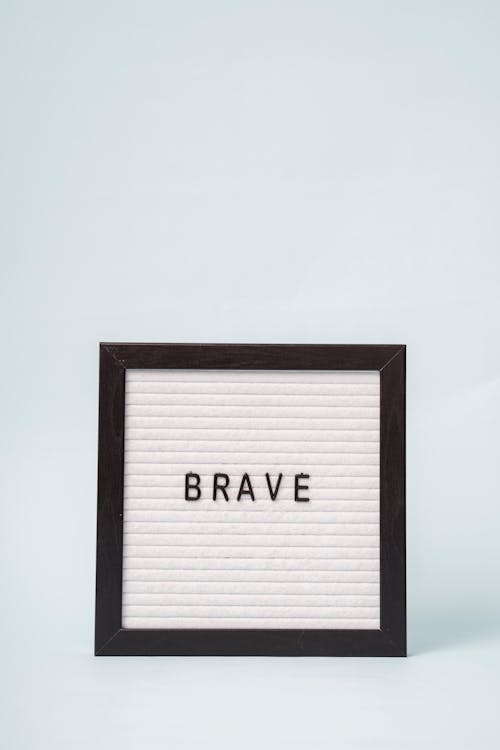 Free Brave Word on Letter Board Stock Photo
