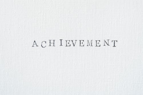 Achievement Text on White Background