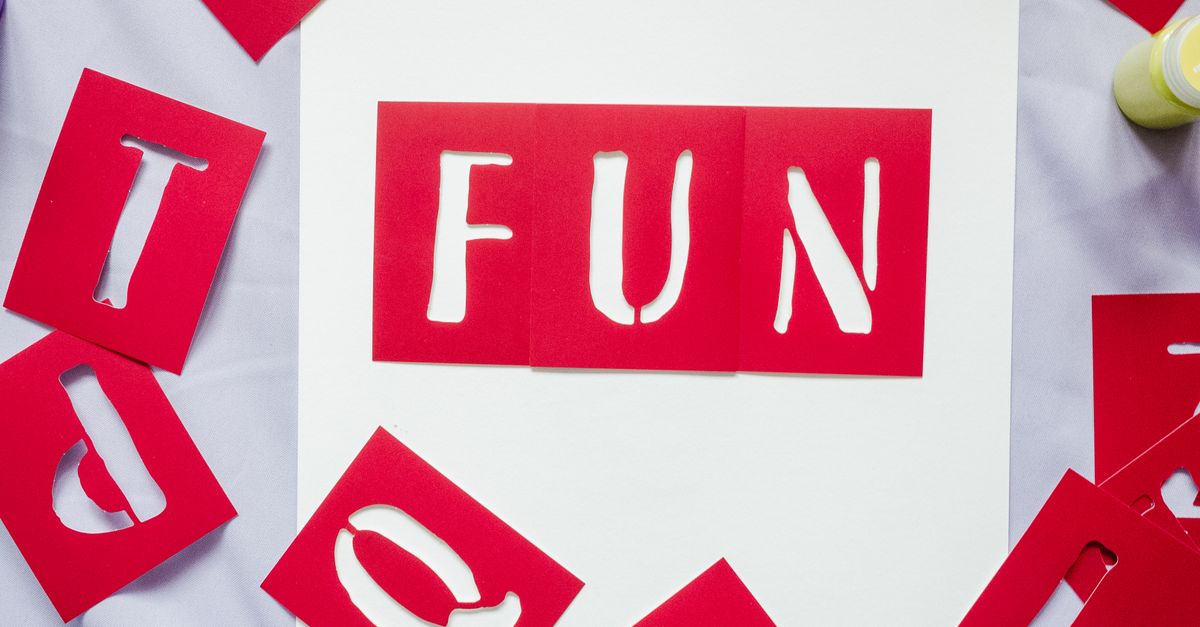 Red Letter Stencils on White Paper · Free Stock Photo