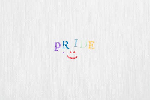 Free Colorful Text on White Surface Stock Photo