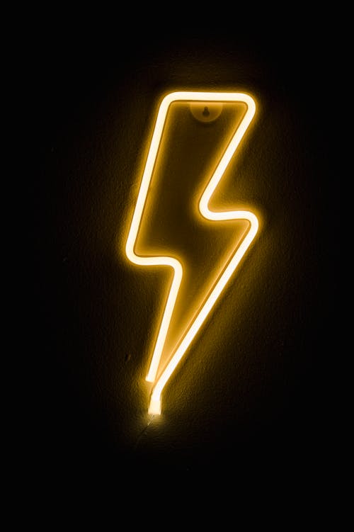 Free A Lightning Bolt Shaped Neon Sign Stock Photo