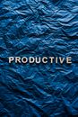 The Word Productive on Crumpled Paper