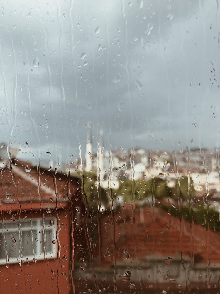 Water Dripping On A Glass Window