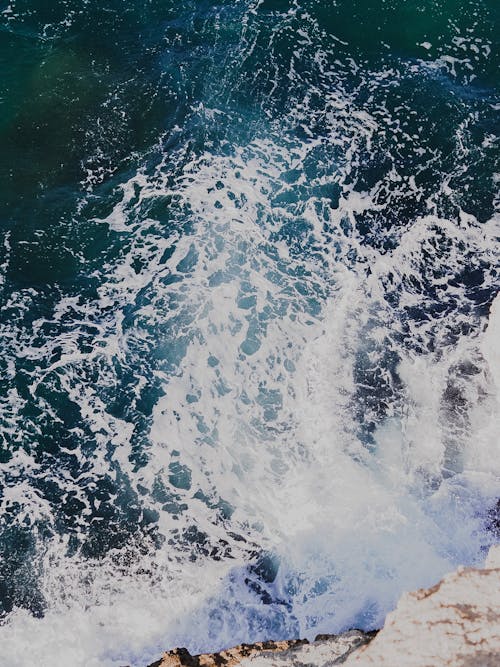 Aerial Shot of Water Waves in the Ocean