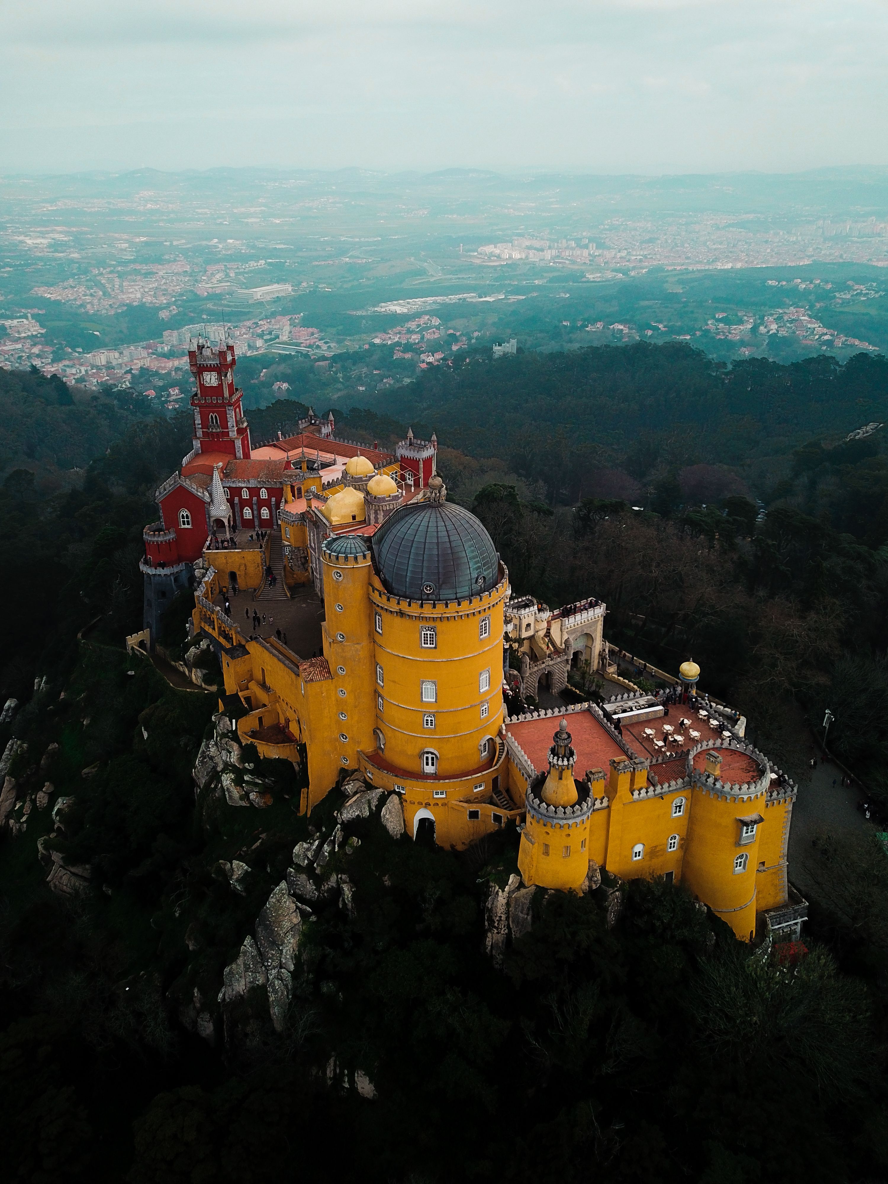Aerial view of the colourful Pena Palace and forest, Sintra, Portugal
