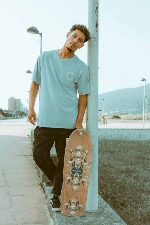Δωρεάν στοκ φωτογραφιών με skateboard, άνδρας, κατακόρυφη λήψη