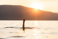 Woman in Black Bikini on Water