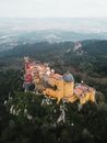 Orange and White Concrete Building on Top of Mountain