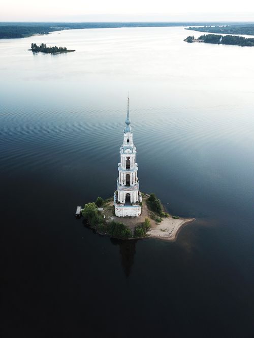 Free Stunning aerial view of the submerged Kalyazin Bell Tower surrounded by water in Russia. Stock Photo
