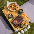 Black Ceramic Bowl on Brown Wooden Chopping Board