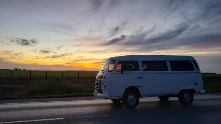 White Van On Road During Sunset