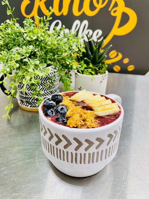 White Ceramic Bowl With Banana and Berries