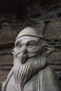 Brown Concrete Statue of Man