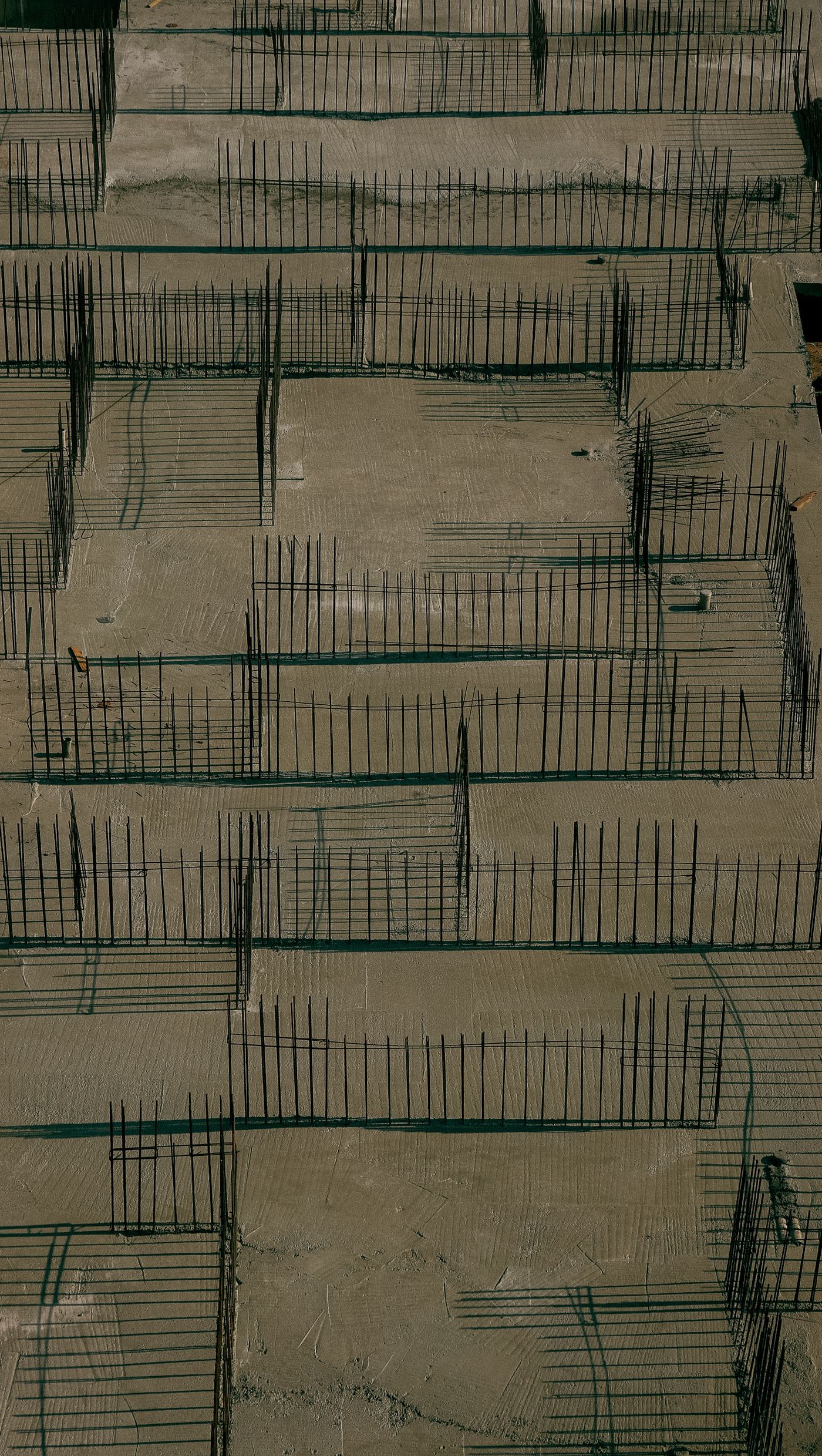 Aerial view of concrete foundation layout and site preparation
