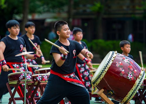Free Shallow Focus of a Boy Playing Taiko Japanese Drum Stock Photo