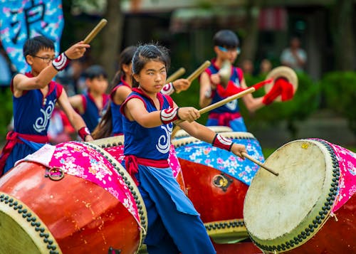 Young Boys and Girls Playing Drums in a Parade