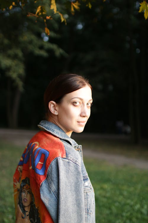 Close-Up Shot of a Woman Wearing a Denim Jacket