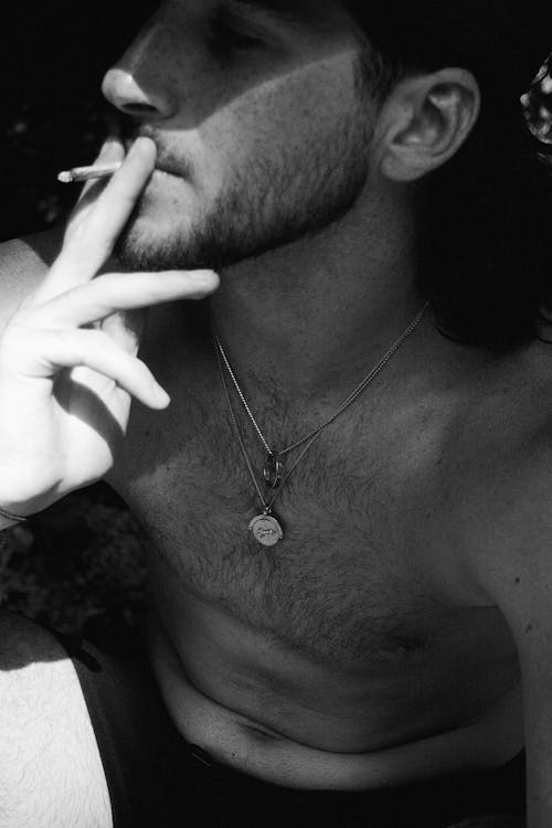 Free Grayscale Photo of Man Smoking Cigarette Stock Photo