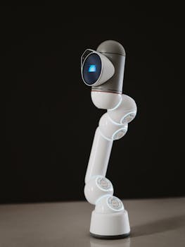 A sleek, futuristic robotic arm against a dark background showcasing modern technology.