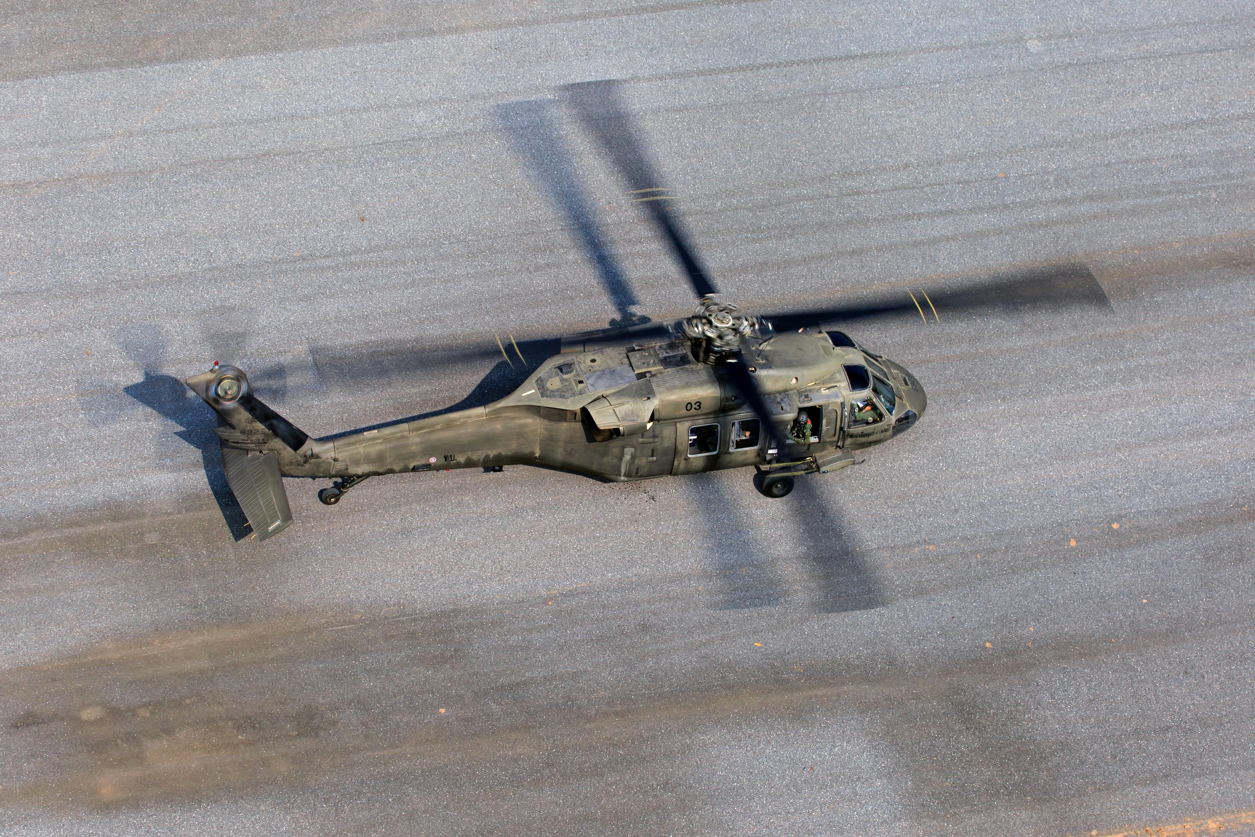 Gray Helicopter On Gray Road · Free Stock Photo