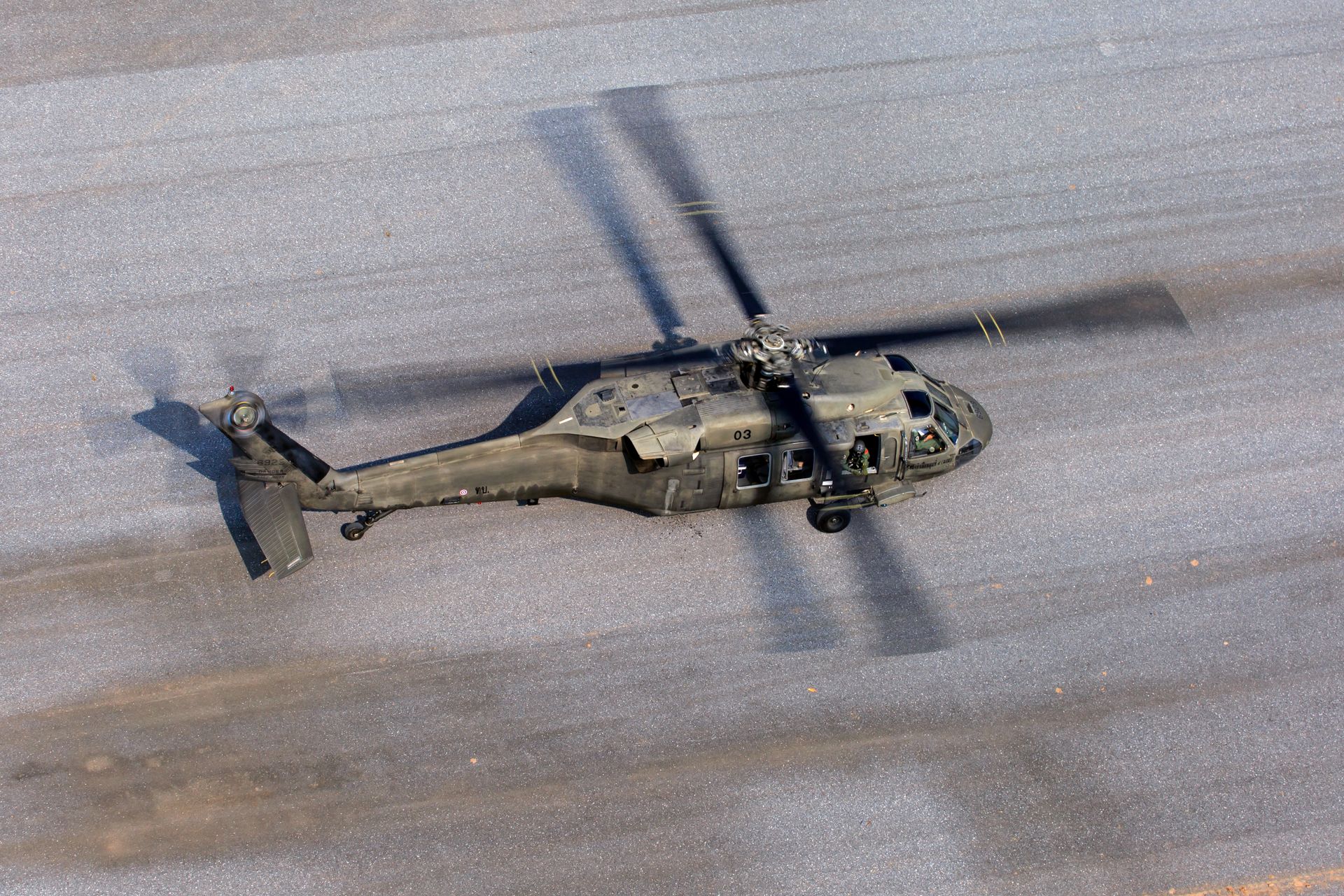 Gray Helicopter on Gray Road