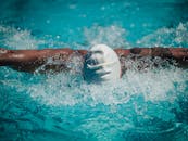 White and Blue Plastic Mask on Water