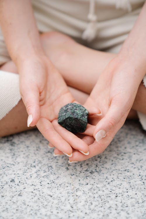 A Person Holding a Gemstone