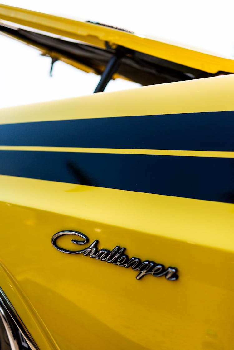 Emblem Of A Yellow Dodge Challenger