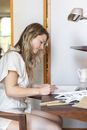 Woman Painting on White Canvas