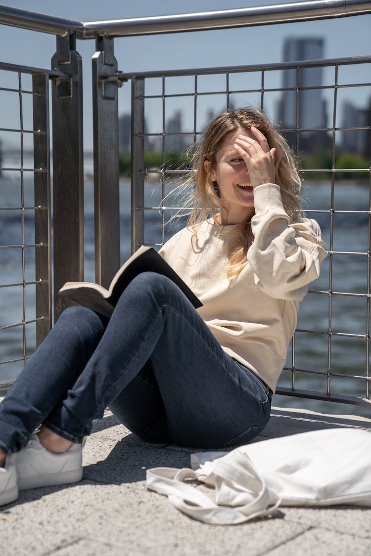 Woman Sitting With Book