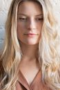 Woman With Blonde Hair and Black Eyes