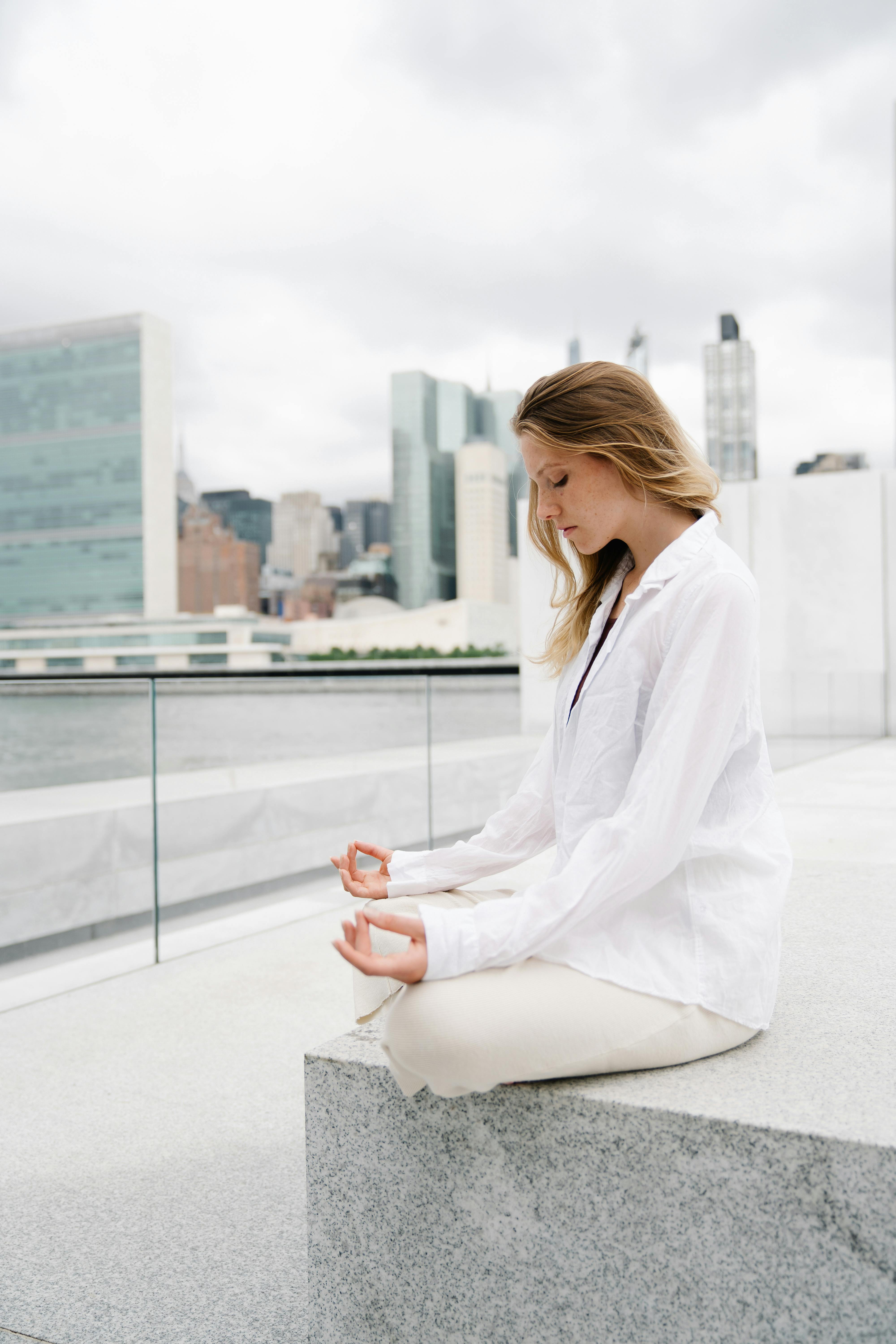 photo of a meditating woman