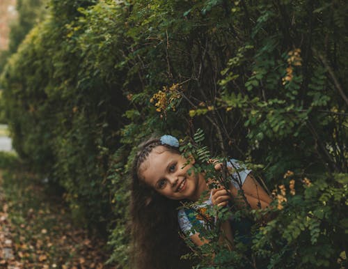 Girl Hiding on the Plants 