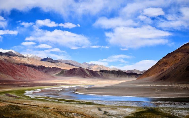 Brown Mountains Under Blue Sky