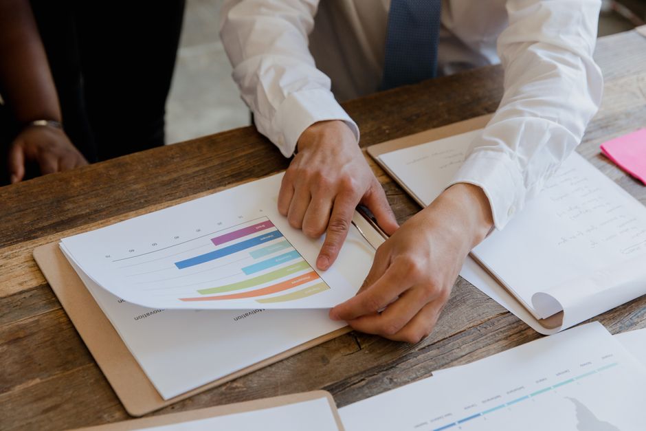 Web Design Services in Edmonton for Small Businesses Edmonton small business owner reviewing web design results and local SEO rankings with agency team