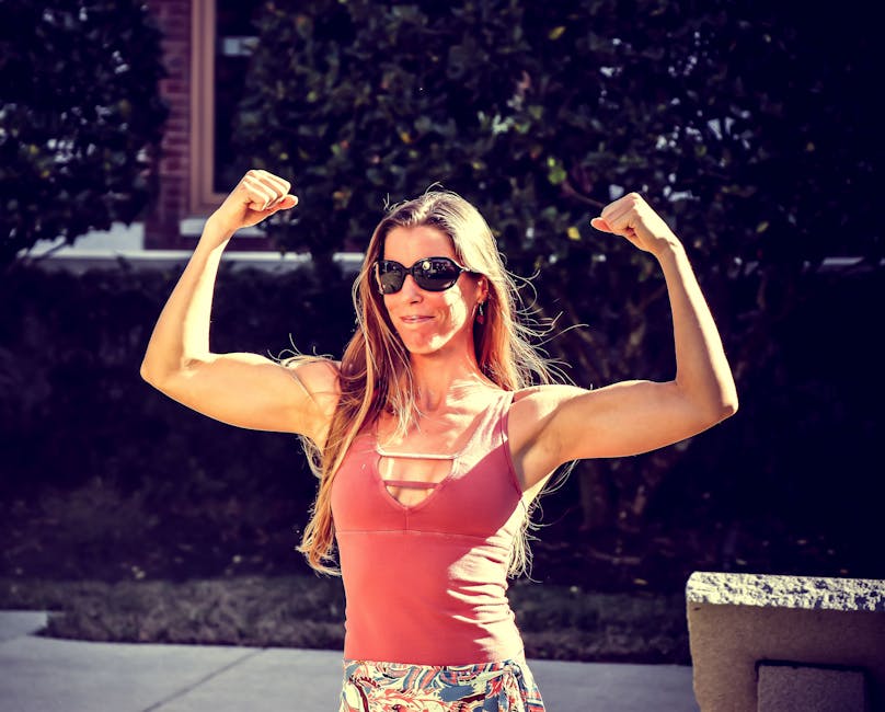 Woman Showing Muscles