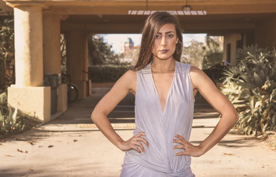 Woman Wearing White Sleeveless Dress