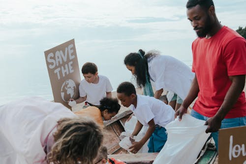 People Cleaning the Beach