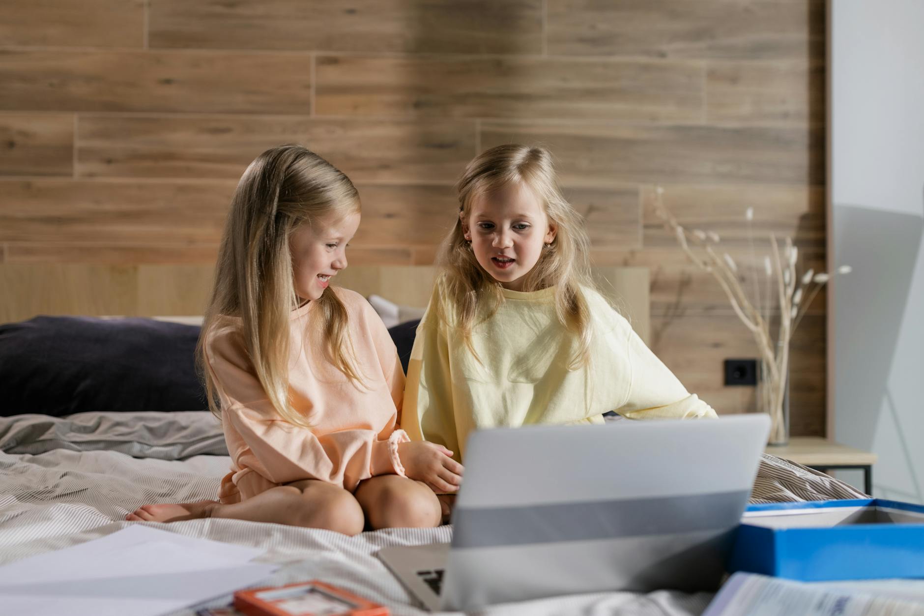 Twin Girls Doing Online Learning at Home
