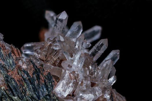 Detailed macro shot of a clear quartz crystal cluster showcasing natural mineral beauty.