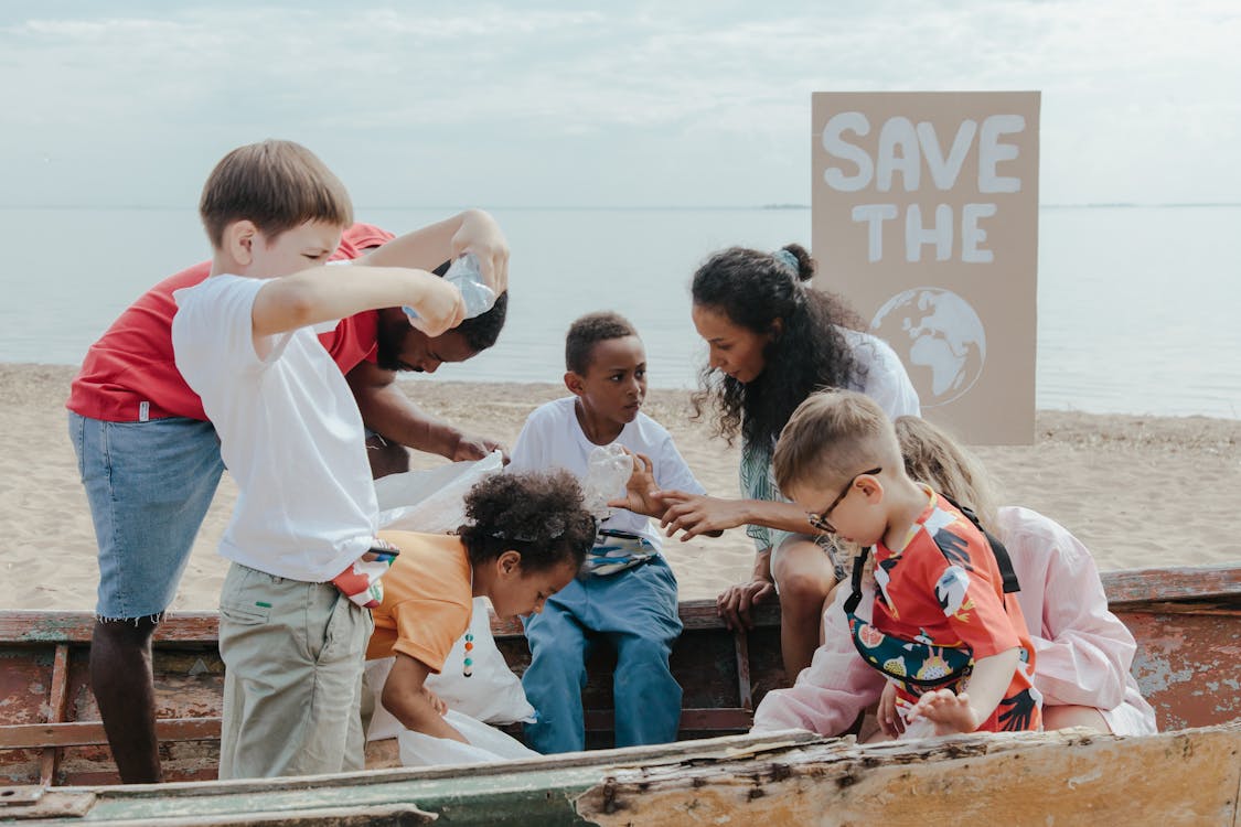 Group of Children Collecting Plastics · Free Stock Photo