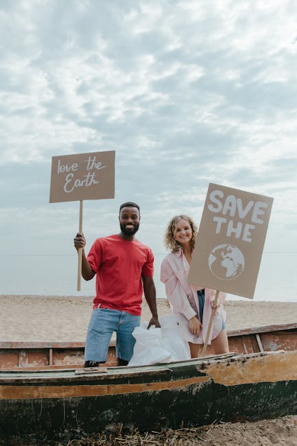 A diverse group of people smiling and holding up signs promoting waste reduction and sustainability.