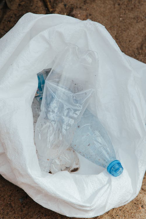 Pieces of Bottles in a Plastic Bag